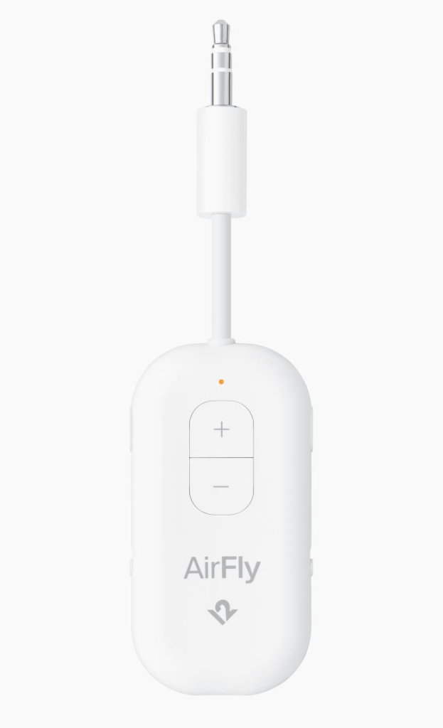 Twelve South AirFly Pro Bluetooth transmitter plugged into an airline seat headphone jack